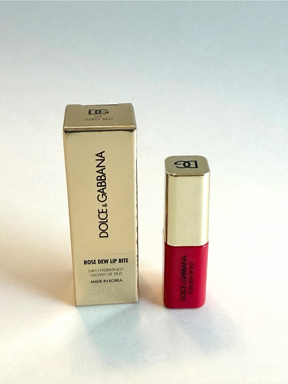 Dolce & Gabbana Rose Dew Lip Bite 24H Hydrating Glossy Lip Tint in Flirty Red - Picture 2 of 6